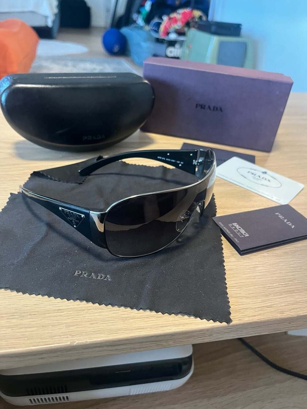 Prada SPR 57L Shield Sunglasses Gunmetal Grey Gradient 120